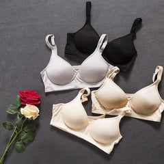 Silk wireless seamless bras in grey, black, and beige with adjustable straps, designed for everyday wear.