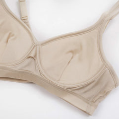 Seamless wire-free silk bra in beige, featuring adjustable straps and 3/4 cup design for everyday comfort.